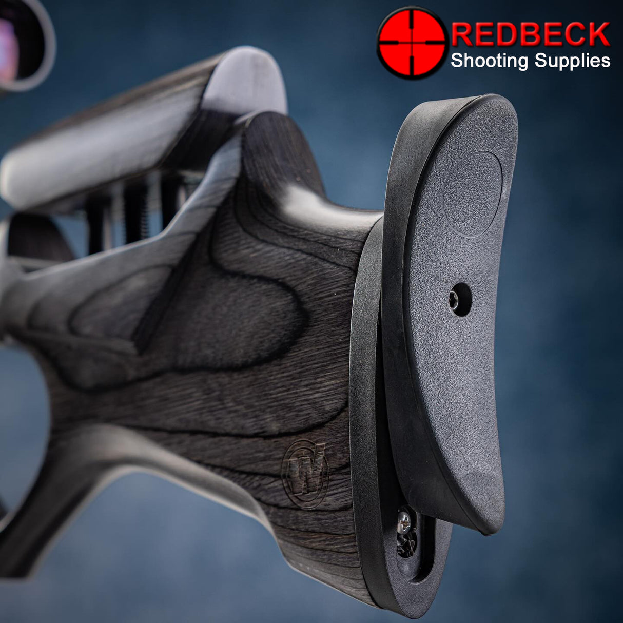 Weihrauch HW110 laminate air rifle shown a close up view of the adjustable butt plate.