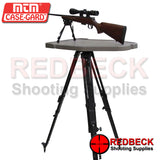 MTM HIGH LOW SHOOTING TABLE SHOWN WITH RIFLE. All new, bench rest style shooting table. Extreme high and low adjustability with three-legged stability. Large 17" x 33" table surface.