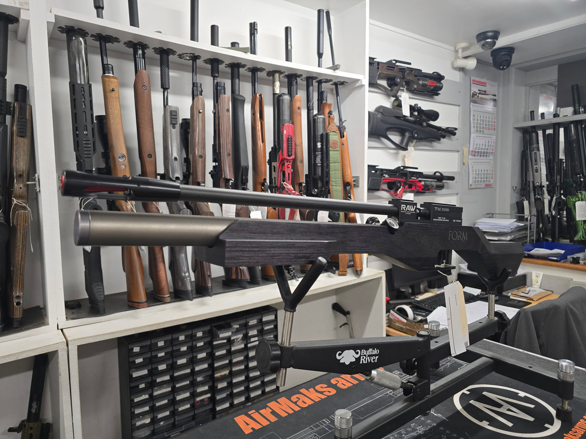 Second hand RAW TM1000 black laminate benchrest .177
