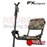 FX Easy Shot Folding Camo Shooting Chair. Shown left hand angled view of camo chair and camo shooting rest stick.